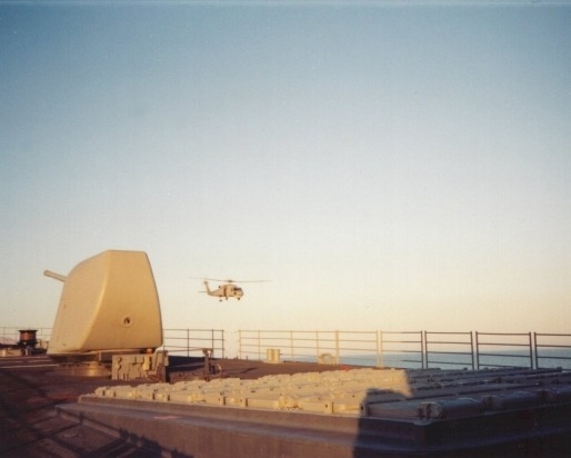 USS Hayler's forecastle with helicopter in background